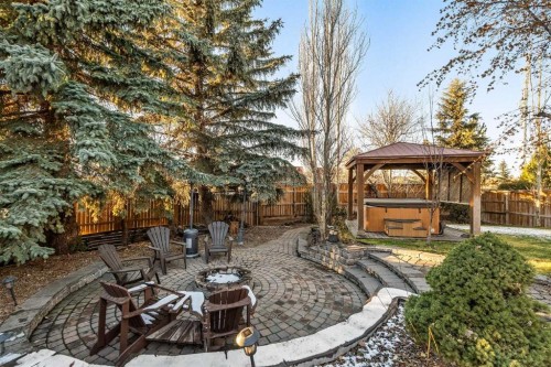 25 Mckinley Bay Se, Calgary, AB - Outdoor With Deck Patio Veranda With Backyard