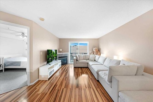 4214-4975 130 Avenue Se, Calgary, AB - Indoor Photo Showing Living Room