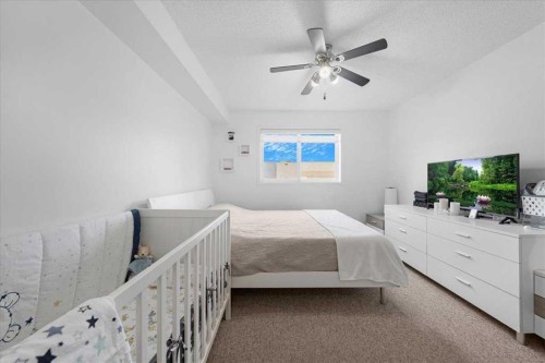 4214-4975 130 Avenue Se, Calgary, AB - Indoor Photo Showing Bedroom