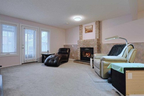 252 Citadel Park Nw, Calgary, AB - Indoor With Fireplace