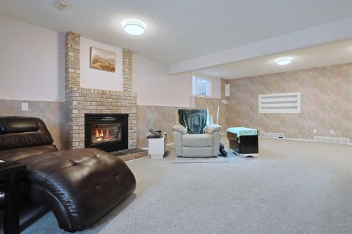 252 Citadel Park Nw, Calgary, AB - Indoor With Fireplace
