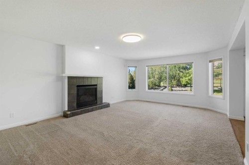 432 Royal Oak Circle Nw, Calgary, AB - Indoor Photo Showing Living Room With Fireplace