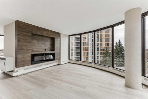 351-7030 Coach Hill Road Sw, Calgary, AB - Indoor Photo Showing Living Room With Fireplace