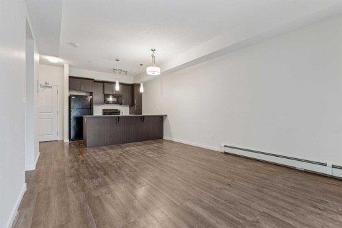 9211-101 Sunset Drive, Cochrane, AB - Indoor Photo Showing Kitchen