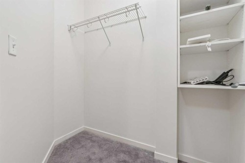 9211-101 Sunset Drive, Cochrane, AB - Indoor With Storage
