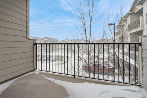 9211-101 Sunset Drive, Cochrane, AB - Outdoor With Balcony With Exterior