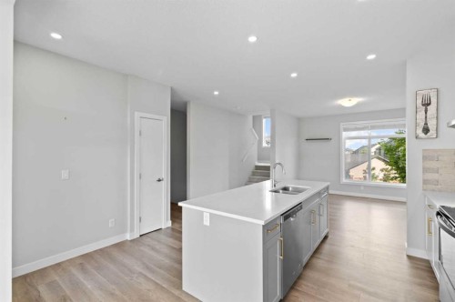 75 Sage Meadows Circle Nw, Calgary, AB - Indoor Photo Showing Kitchen With Double Sink