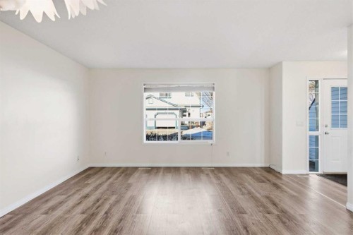 21-33 Stonegate Drive Nw, Airdrie, AB - Indoor Photo Showing Other Room