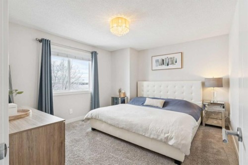157 Chaparral Court Se, Calgary, AB - Indoor Photo Showing Bedroom