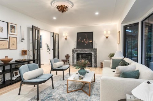 1011 Lake Wapta Way Se, Calgary, AB - Indoor Photo Showing Living Room With Fireplace