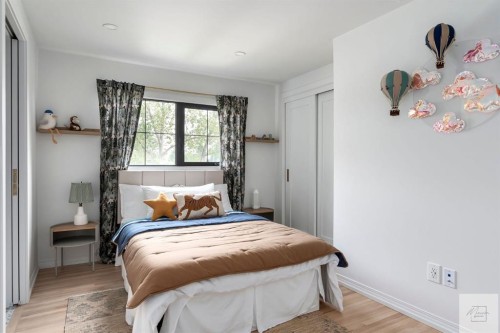 1011 Lake Wapta Way Se, Calgary, AB - Indoor Photo Showing Bedroom