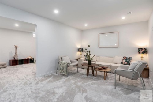 1011 Lake Wapta Way Se, Calgary, AB - Indoor Photo Showing Living Room