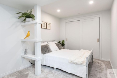 1011 Lake Wapta Way Se, Calgary, AB - Indoor Photo Showing Bedroom