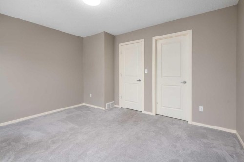 111 Ascot Point Sw, Calgary, AB - Indoor Photo Showing Other Room