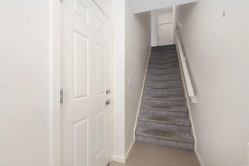111 Ascot Point Sw, Calgary, AB - Indoor Photo Showing Other Room