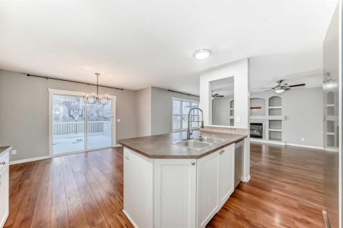340 Morningside Crescent Sw, Airdrie, AB - Indoor Photo Showing Kitchen With Double Sink