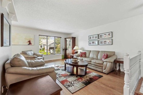 103 Sandarac Place Nw, Calgary, AB - Indoor Photo Showing Living Room