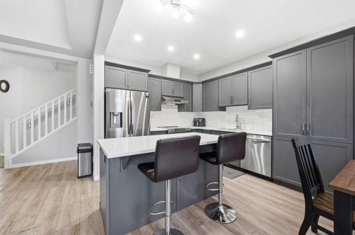 9 Osborne Link, Airdrie, AB - Indoor Photo Showing Kitchen With Stainless Steel Kitchen With Upgraded Kitchen