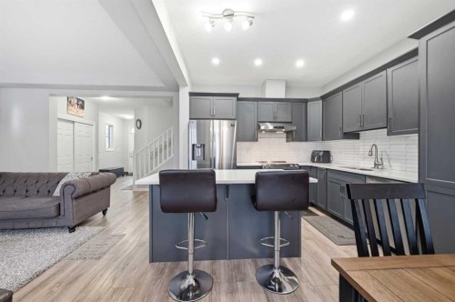 9 Osborne Link, Airdrie, AB - Indoor Photo Showing Kitchen With Stainless Steel Kitchen With Upgraded Kitchen