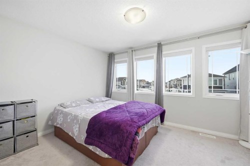 9 Osborne Link, Airdrie, AB - Indoor Photo Showing Bedroom