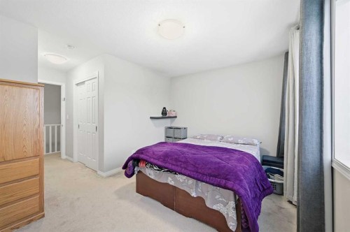 9 Osborne Link, Airdrie, AB - Indoor Photo Showing Bedroom