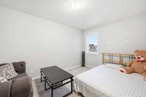 9 Osborne Link, Airdrie, AB - Indoor Photo Showing Bedroom