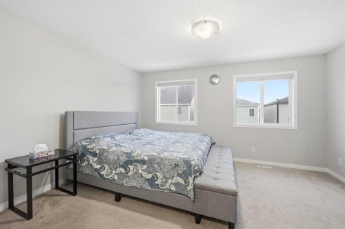 9 Osborne Link, Airdrie, AB - Indoor Photo Showing Bedroom