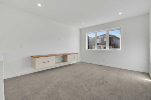 566 Rivercrest View, Cochrane, AB - Indoor Photo Showing Other Room