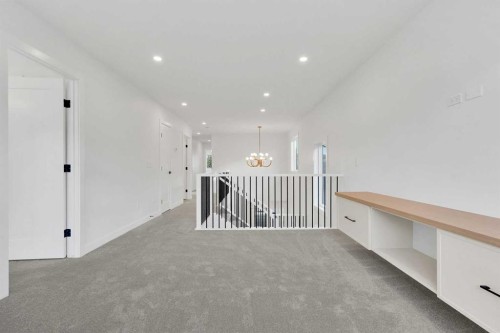 566 Rivercrest View, Cochrane, AB - Indoor Photo Showing Other Room