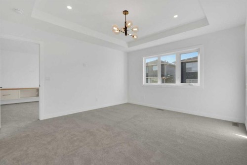 566 Rivercrest View, Cochrane, AB - Indoor Photo Showing Other Room