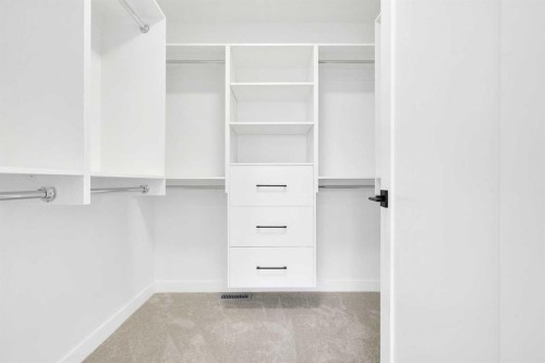 566 Rivercrest View, Cochrane, AB - Indoor With Storage