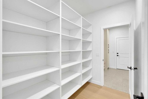 566 Rivercrest View, Cochrane, AB - Indoor With Storage