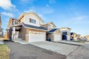566 Rivercrest View, Cochrane, AB  - Outdoor With Facade 