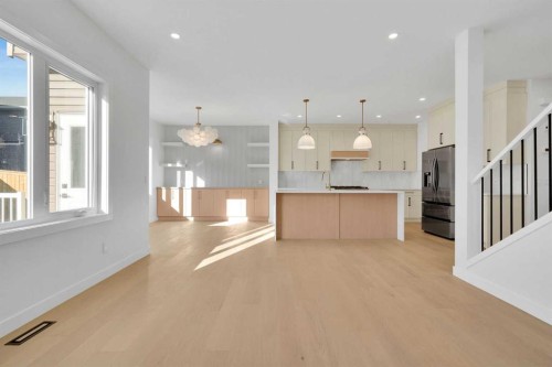 566 Rivercrest View, Cochrane, AB - Indoor Photo Showing Kitchen