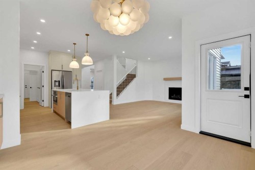 566 Rivercrest View, Cochrane, AB - Indoor Photo Showing Kitchen