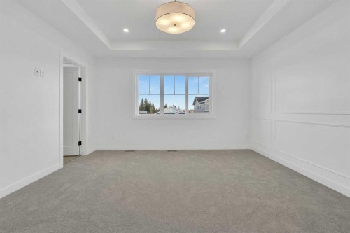 566 Rivercrest View, Cochrane, AB - Indoor Photo Showing Other Room