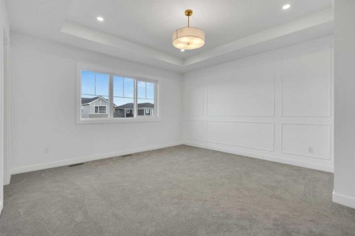 566 Rivercrest View, Cochrane, AB - Indoor Photo Showing Other Room