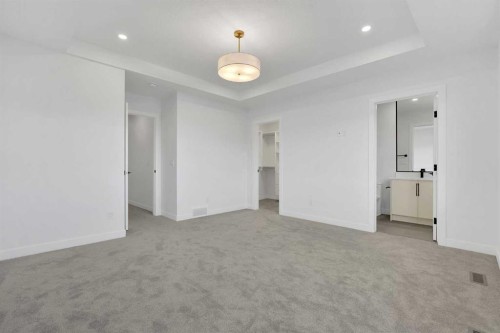 566 Rivercrest View, Cochrane, AB - Indoor Photo Showing Other Room