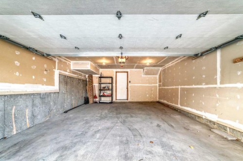 119 Auburn Meadows Walk Se, Calgary, AB - Indoor Photo Showing Garage