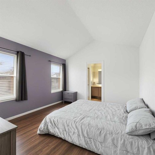 8 Copperfield Manor Se, Calgary, AB - Indoor Photo Showing Bedroom