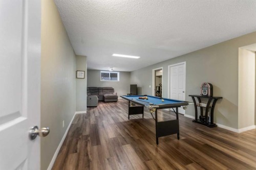 8 Copperfield Manor Se, Calgary, AB - Indoor Photo Showing Other Room