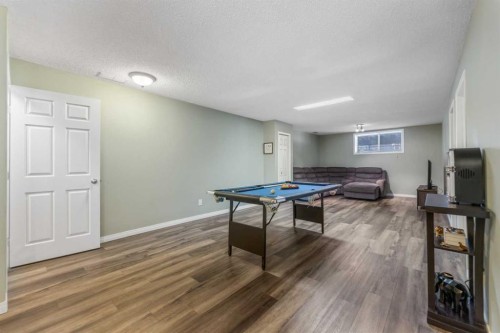 8 Copperfield Manor Se, Calgary, AB - Indoor Photo Showing Other Room