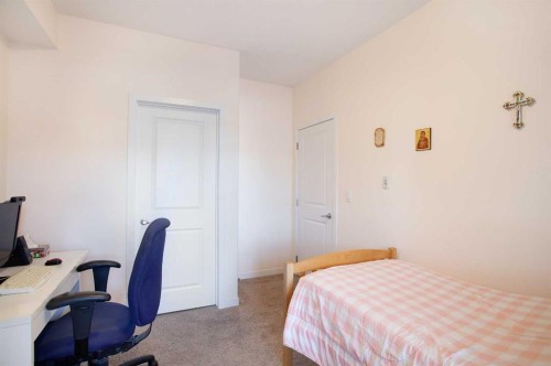 103-200 Cranfield Common Se, Calgary, AB - Indoor Photo Showing Bedroom