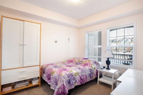 103-200 Cranfield Common Se, Calgary, AB - Indoor Photo Showing Bedroom