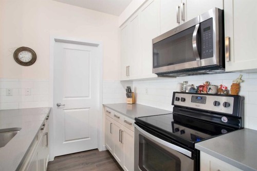 103-200 Cranfield Common Se, Calgary, AB - Indoor Photo Showing Kitchen