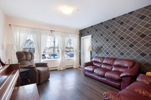 103-200 Cranfield Common Se, Calgary, AB - Indoor Photo Showing Living Room