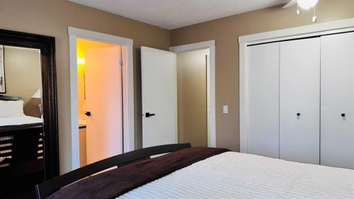 14691 Deer Ridge Drive Se, Calgary, AB - Indoor Photo Showing Bedroom
