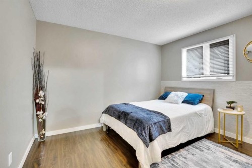 14691 Deer Ridge Drive Se, Calgary, AB - Indoor Photo Showing Bedroom