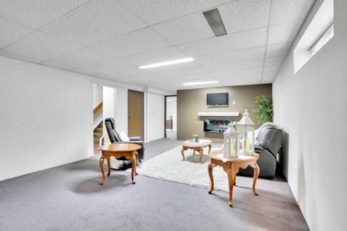 14691 Deer Ridge Drive Se, Calgary, AB - Indoor With Fireplace