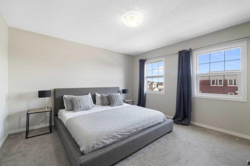 211 Evanscrest Way Nw, Calgary, AB - Indoor Photo Showing Bedroom